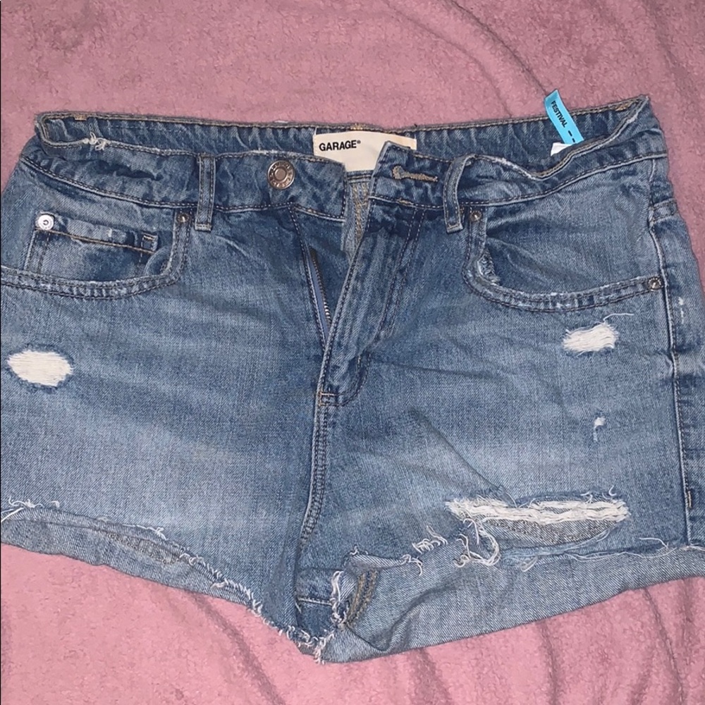 Garage “festival” shorts distressed denim